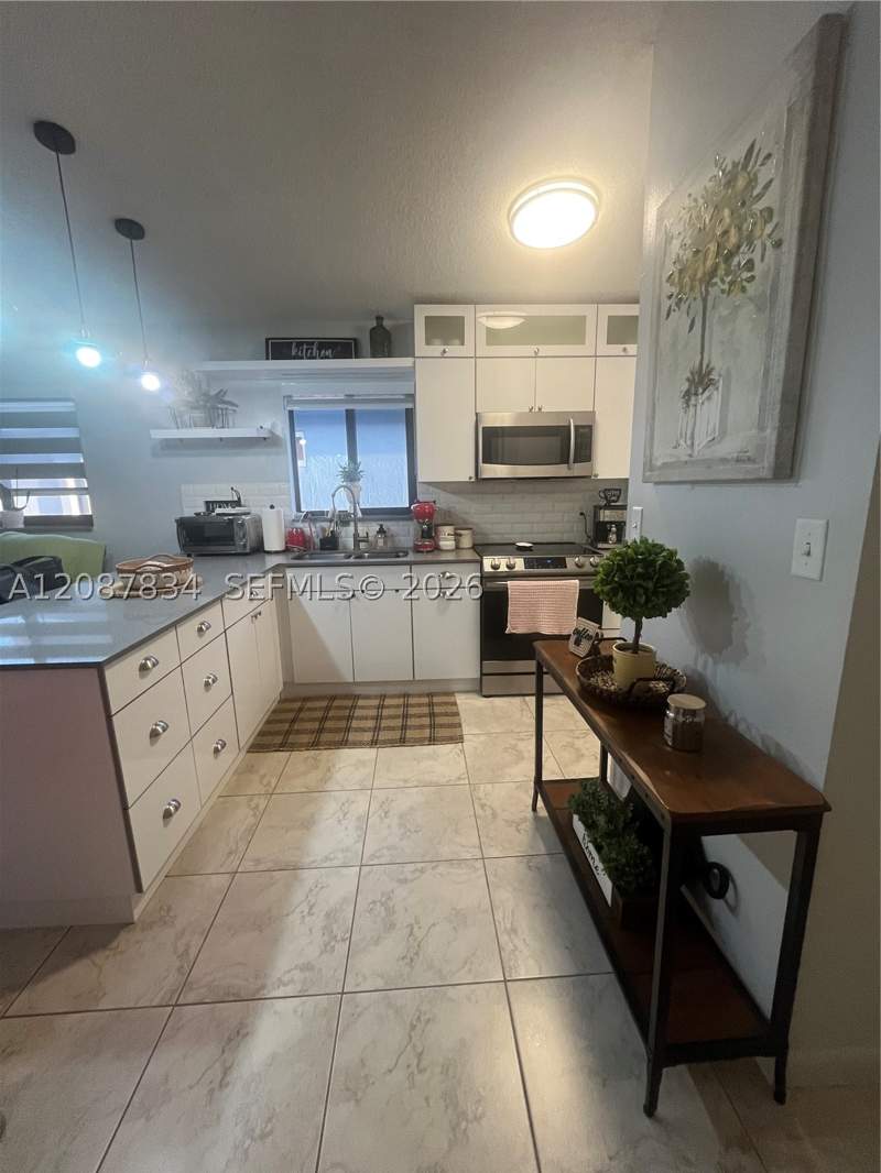 4 bedroom SingleFamilyResidence at 7801 W 30th Ln, Ponderosa Phase 1, Hialeah — photo 5