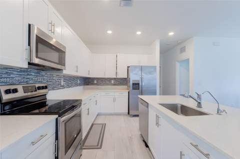 12740 SW 214th Ter, Miami FL - photo 11 of 48
