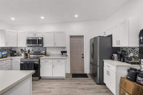 314 NW 106th St, Miami FL - photo 9 of 36