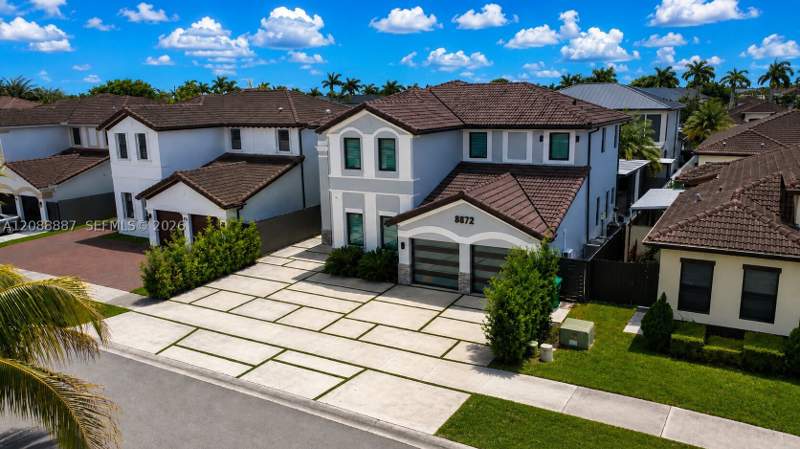 4 bedroom SingleFamilyResidence at 8872 NW 181st St, Century Gardens, Hialeah Gardens — photo 2