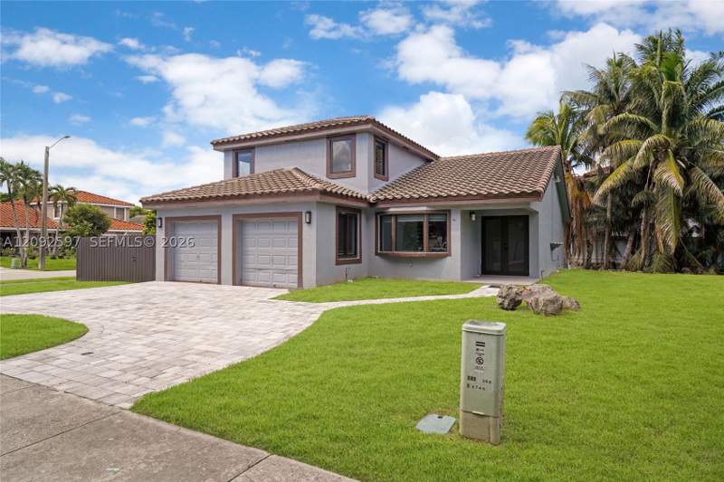 5 bedroom SingleFamilyResidence at 8745 NW 150th Ter, West Lakes Gardens, Miami Lakes — photo 2