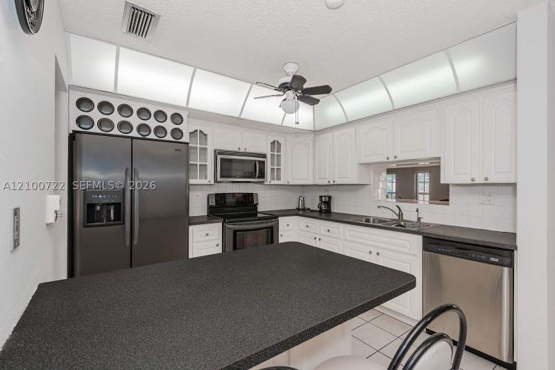 4 bedroom SingleFamilyResidence at 7802 W 18th Ln, Palm Springs Lakes 5th Ad, Hialeah — photo 4