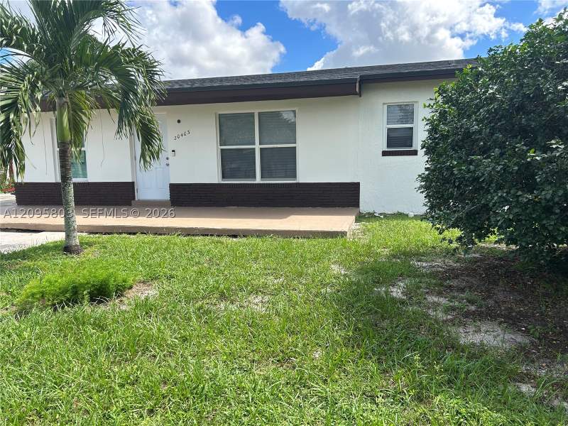 3 bedroom SingleFamilyResidence at 20403 NW 44th Pl, Carol City Gardens 2nd Ad, Miami Gardens — photo 2