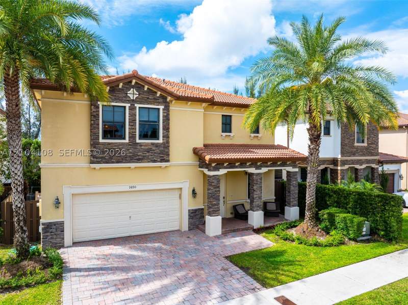 4 bedroom SingleFamilyResidence at 9890 NW 86th Ter, Doral Breeze, Doral — photo 4