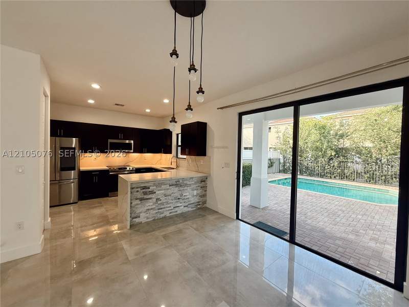 4 bedroom SingleFamilyResidence at 717 NE 191st St, Champion Lakes, Miami — photo 2