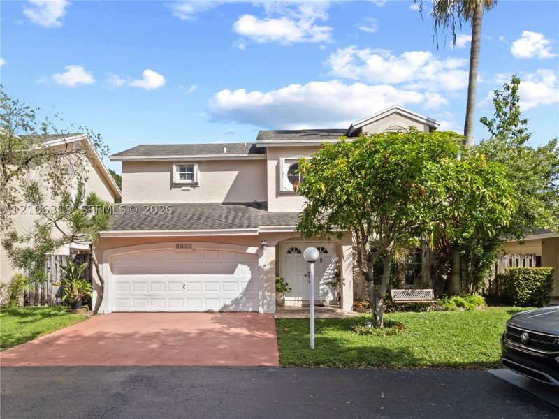 4 bedroom SingleFamilyResidence at 9921 NW 51st Ln, Doral Lakes, Doral — photo 2