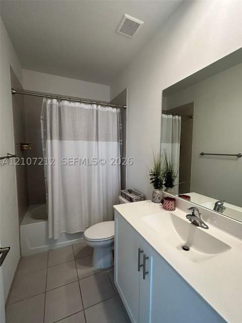 613 NE 208th Ter 613, Miami FL - photo 7 of 27