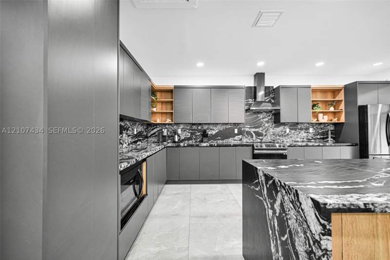 4 bedroom SingleFamilyResidence at 112 NW 53rd St, Railway Shops Addn 2nd Am, Miami — photo 5