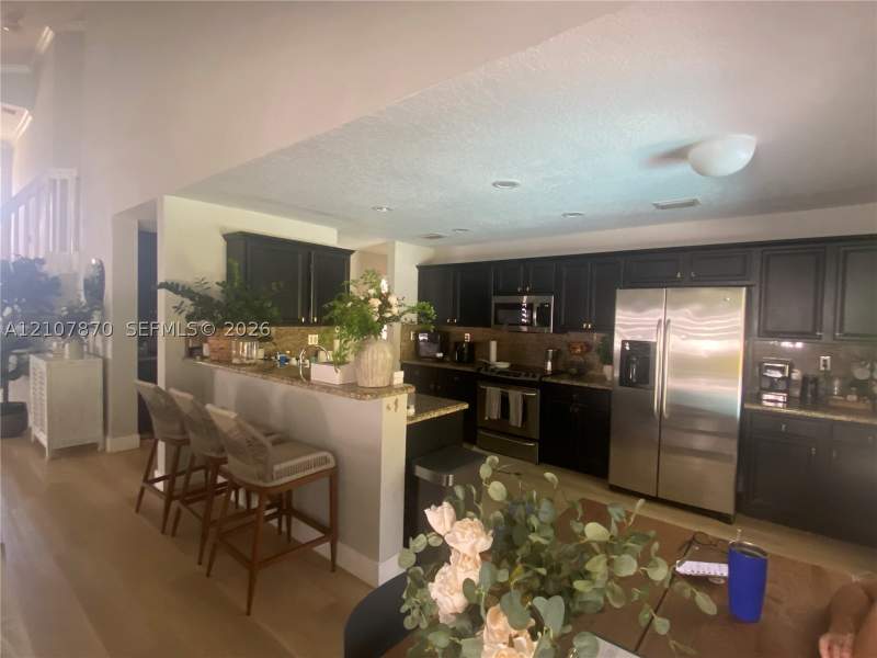 4 bedroom SingleFamilyResidence at 5344 NW 111th Ct, The Reserve At Doral, Doral — photo 3