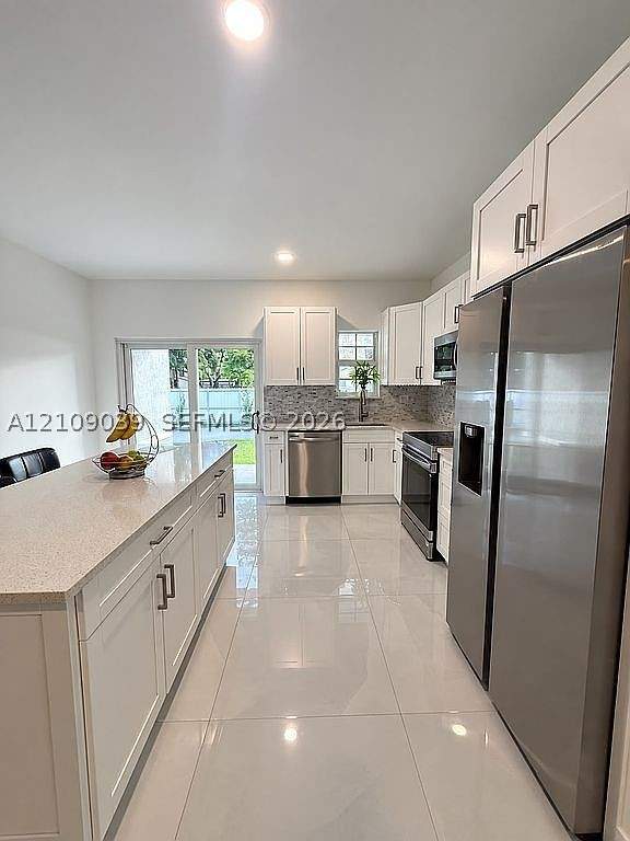 4 bedroom SingleFamilyResidence at 22066 Miami Ave, Realty Sec Corp Addn To G, Miami — photo 4
