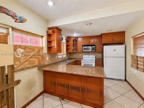 201 NW 61st Ave, Miami FL - photo 8 of 23