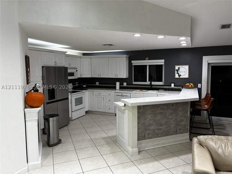 3 bedroom SingleFamilyResidence at 14505 SW 143rd Pl, Country Walk West Sec 1, Miami — photo 4