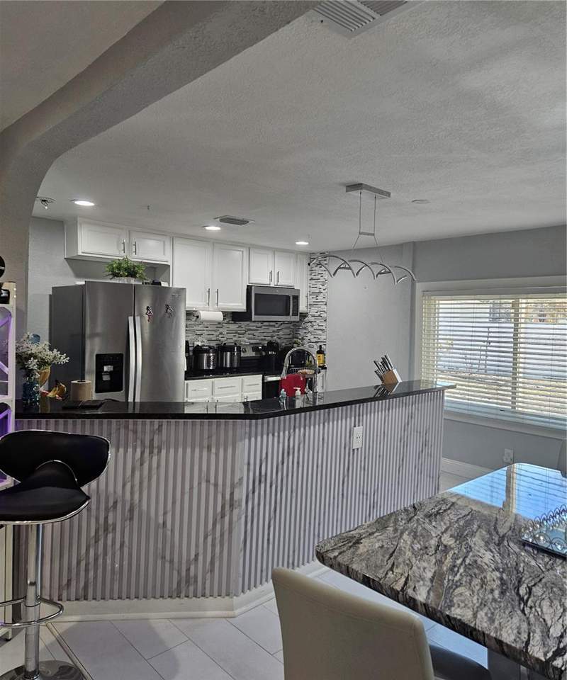 4 bedroom Single Family Residence at 9306 Forest Hills Drive, Tampas North Side Country Clu, Tampa — photo 5