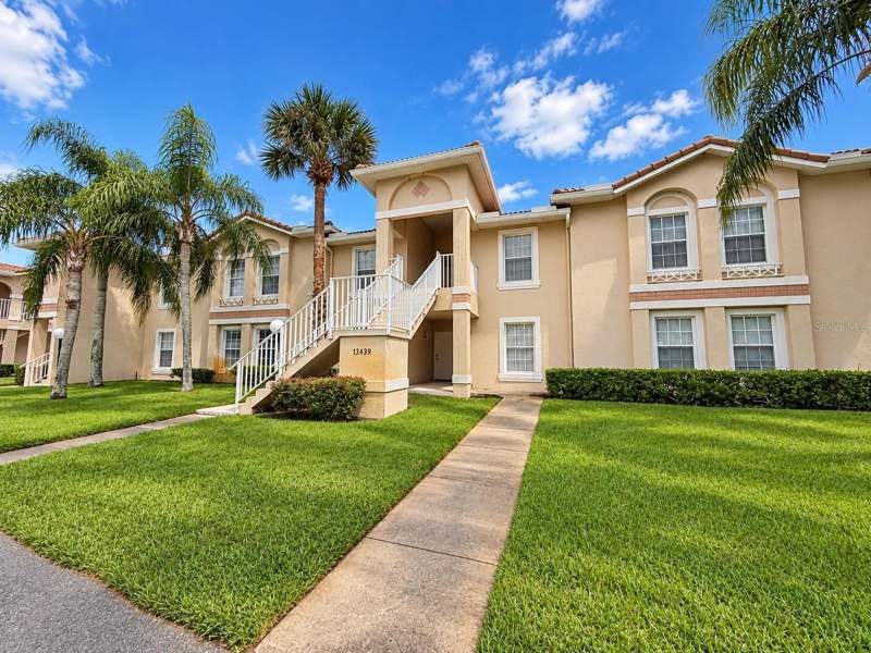 3 bedroom Condominium at 13439 FAIRWAY GLEN DR #103, FAIRWAY GLEN AT MEADOW WOODS CONDO PH 10, ORLANDO — photo 1