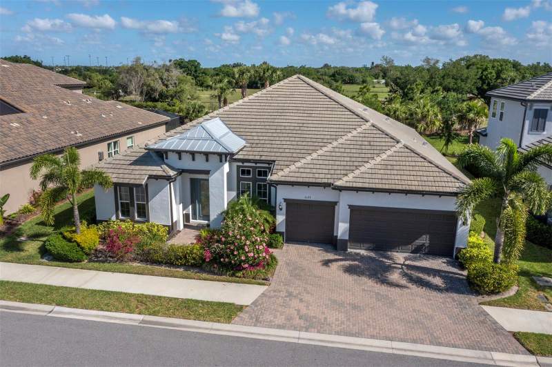 6129 LUNGO LAGO DRIVE home for sale in Rivo Lakes