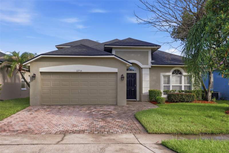 5 bedroom Single Family Residence at 13714 HUNTWICK DRIVE, HUNTERS CREEK TRACT 350 PH 2 33/52 LOT 13, ORLANDO — photo 1