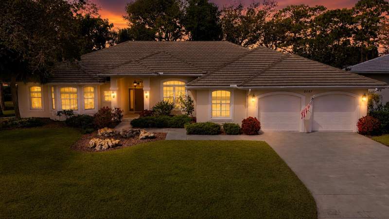 2067 TOCOBAGA LANE home for sale in Calusa Lakes