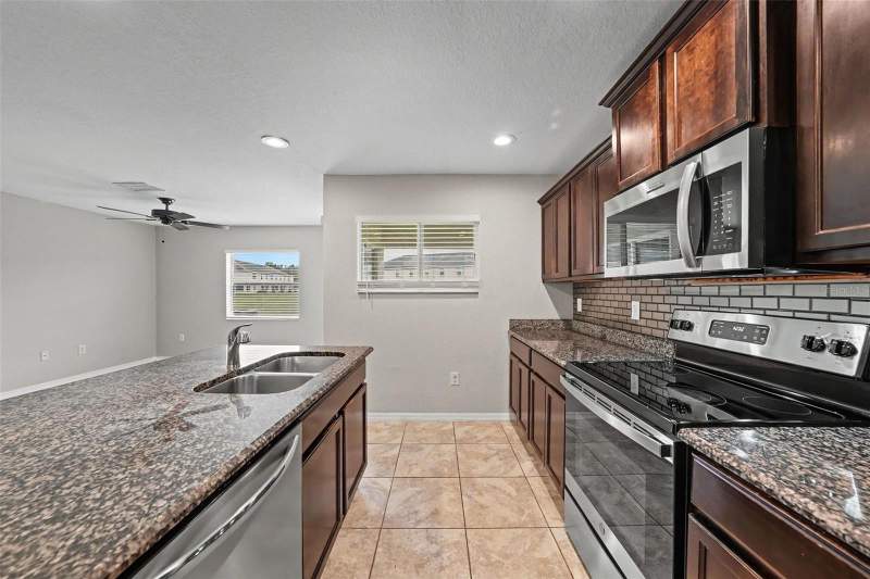 4 bedroom Townhouse at 5042 CHIPOTLE LANE, SANTA FE AT WESTBROOKE, WESLEY CHAPEL — photo 5
