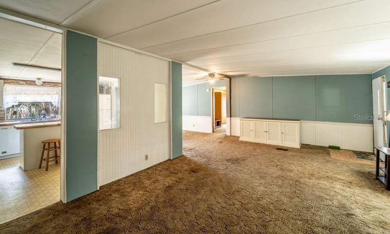 4 bedroom Manufactured Home at 24031 Armadillo Road, Astor Forest Campsites Unrec, Astor — photo 5