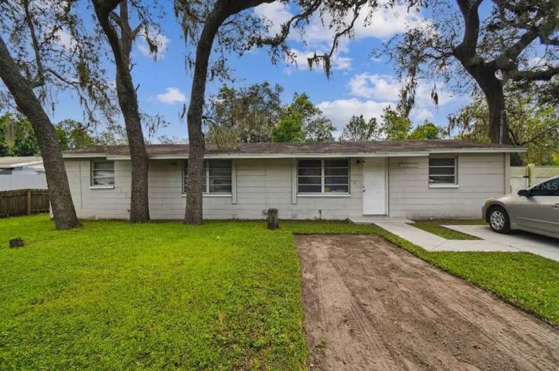 4 bedroom Single Family Residence at 10101 N 11th Street, Castle Heights Map, Tampa — photo 1