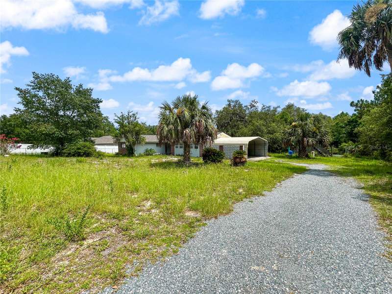 5 bedroom Single Family Residence at 23162 SW Neptune Boulevard, Rainbow Lake Estates, Dunnellon — photo 2
