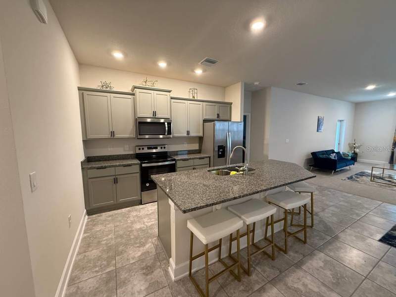 4 bedroom Single Family Residence at 3828 Sagefield Drive, Harmony Central Ph 1, Harmony — photo 4