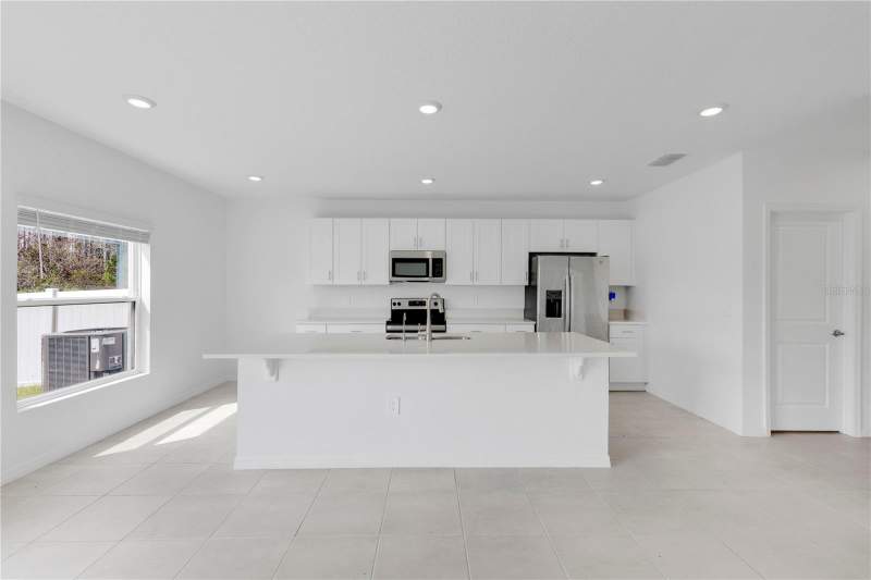 5 bedroom Single Family Residence at 557 Pink Ibis Bend, Southern Pines Ph 4, St Cloud — photo 5