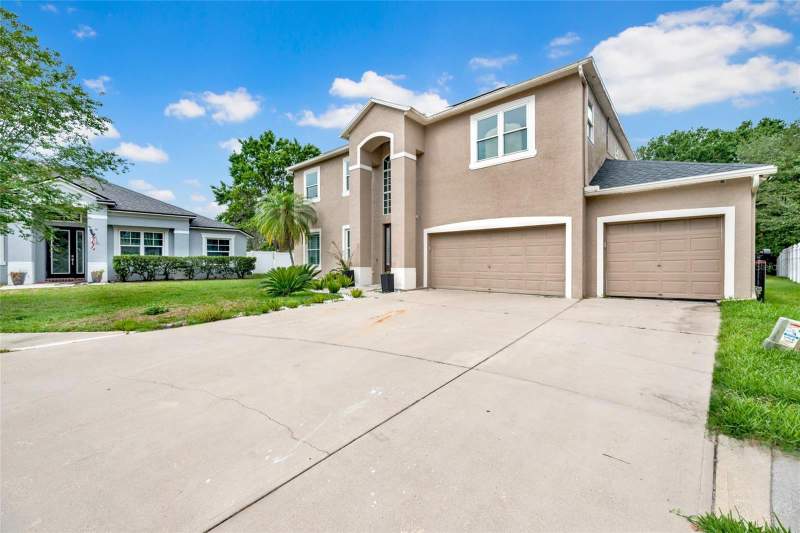 5 bedroom Single Family Residence at 3103 Ashmonte Drive, Oakstead Prcl 06 Unit 01 Prcl 07, Land O Lakes — photo 3
