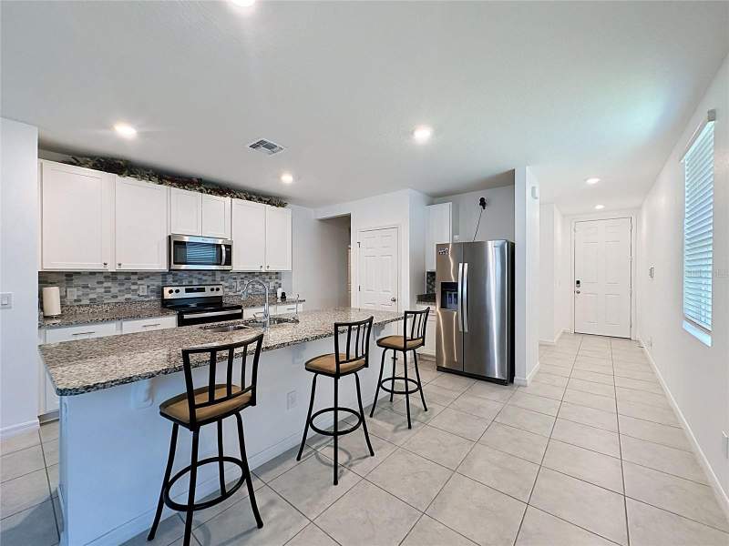 4 bedroom Single Family Residence at 3442 Monaco Ln, Tuscan Meadows, Davenport — photo 4