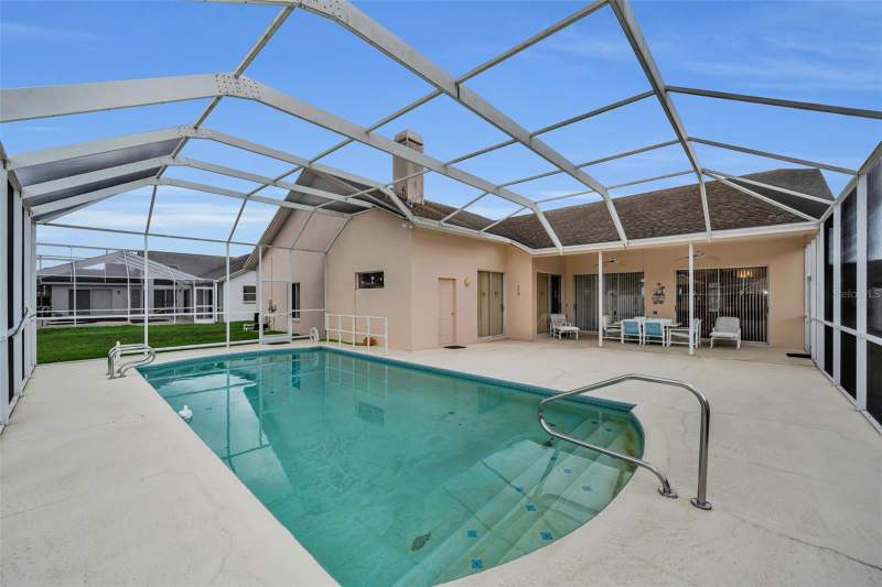 4 bedroom Single Family Residence at 7405 Evesborough Lane, Wyndtree, New Port Richey — photo 5