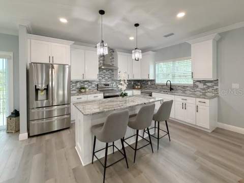 1083 S Pointe Alexis Drive, Tarpon Springs FL - photo 10 of 65