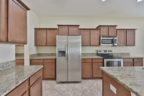 10811 Kirkwall Port Drive, Wimauma FL - photo 15 of 76