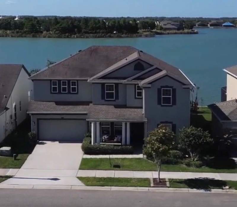 4 bedroom Single Family Residence at 417 Blue Cypress Drive, Waterside Pointe Ph 3, Groveland — photo 2