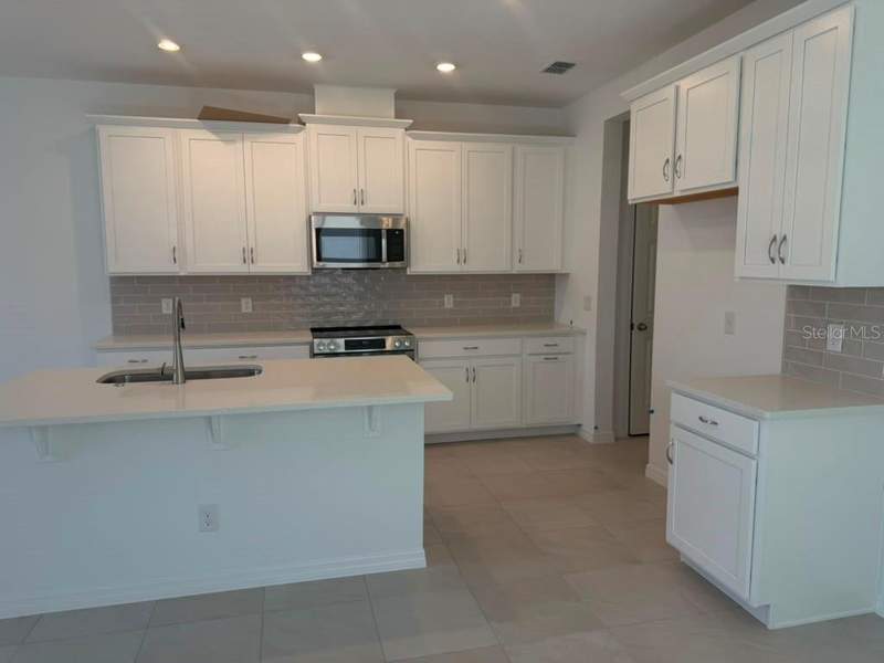 4 bedroom Single Family Residence at 408 Oak Flat Alley, Cypress Bluff Ph 1, Groveland — photo 2