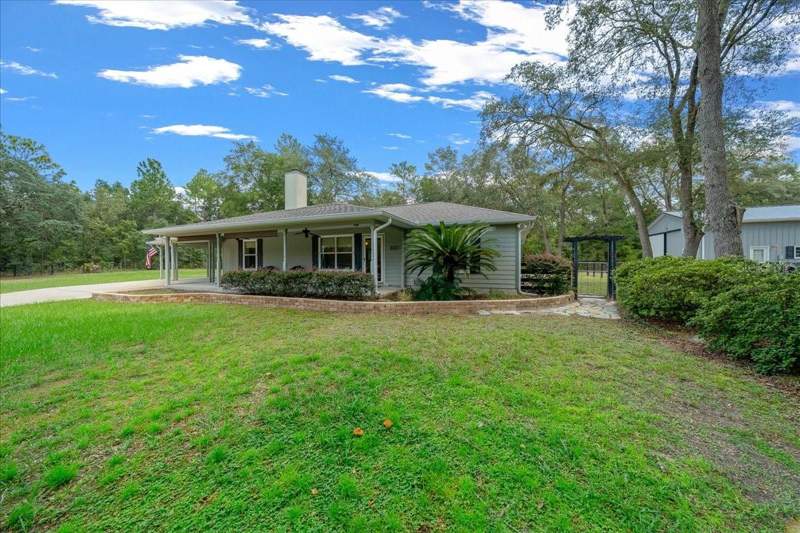 4 bedroom Single Family Residence at 8891 SW 135th Avenue, Rainbow Park 04, Dunnellon — photo 4
