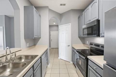 8775 Sartori Street #303, Orlando FL - photo 6 of 27