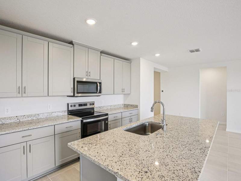 4 bedroom Single Family Residence at 823 Sunshower Drive, The Reserve At Hammock Oaks, Lady Lake — photo 3