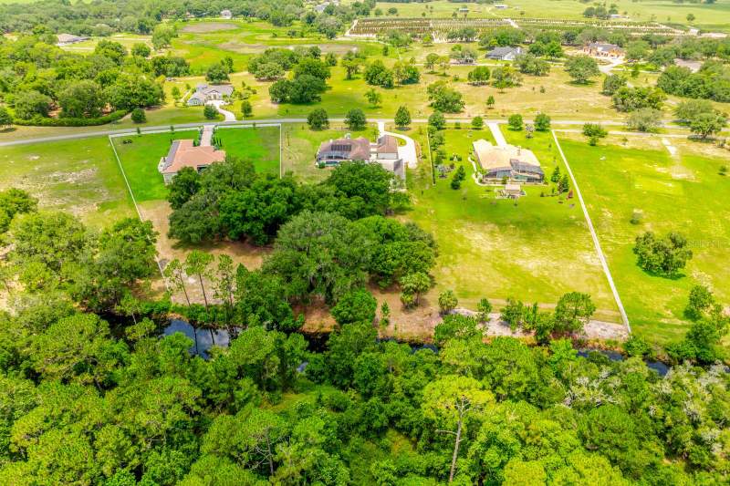 6 bedroom Single Family Residence at 27324 Grand Oak Lane, Beauclair Ranch Club Sub, Tavares — photo 3