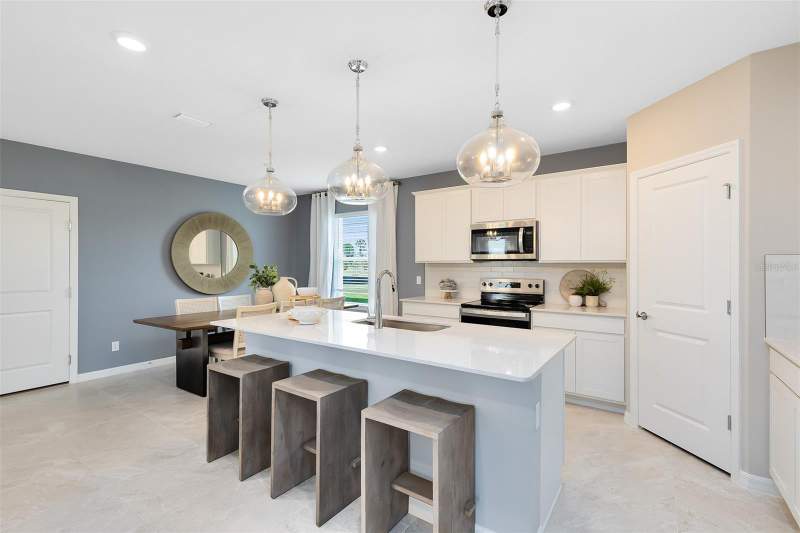 5 bedroom Single Family Residence at 5052 SHRUB LEAF ALLEY, THE LANDING'S AT LIVE OAK, ST CLOUD — photo 4