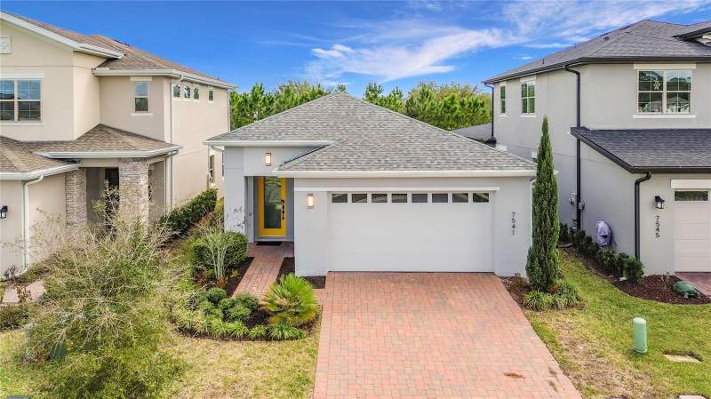3 bedroom Single Family Residence at 7541 WING SPAN WAY, ENCLAVE AT LAKES OF HARMONY, HARMONY — photo 2