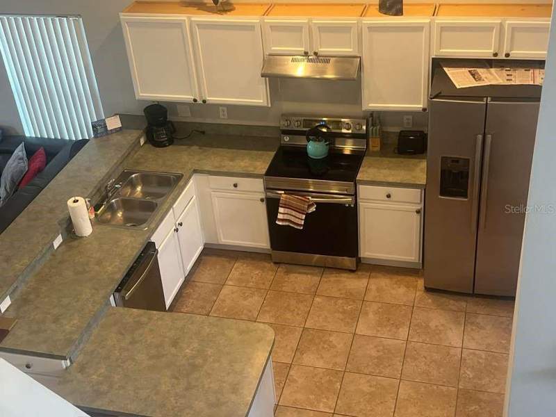 5 bedroom Single Family Residence at 115 Castlemain Circle, Hampton Estates, Davenport — photo 4