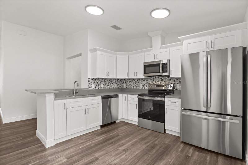 4 bedroom Single Family Residence at 706 Beecher Street, Leesburg W C Wilkins 06, Leesburg — photo 4