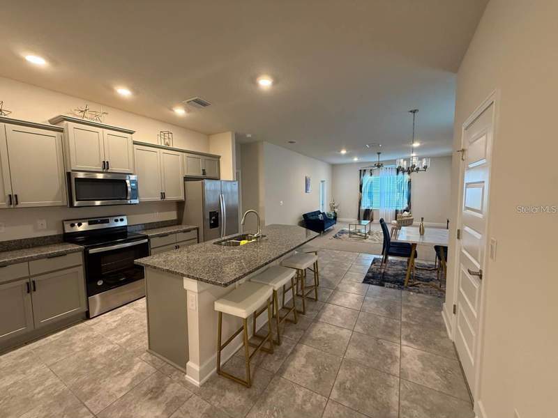 4 bedroom Single Family Residence at 3828 Sagefield Drive, Harmony Central Ph 1, Harmony — photo 5