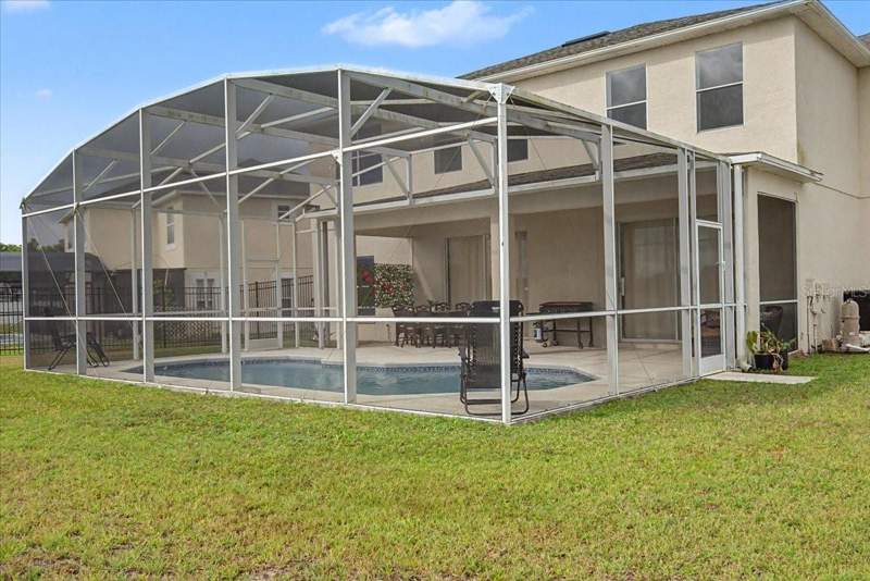 5 bedroom Single Family Residence at 5039 HEATHERLAKE TERRACE, HEATHERSTONE AT CRESCENT LAKES, KISSIMMEE — photo 3