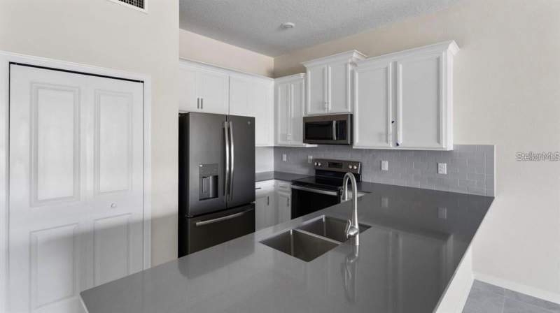 2 bedroom Condominium at 857 OCEAN COURSE AVENUE #857, CHAMPIONSGATE PH 3, DAVENPORT — photo 4