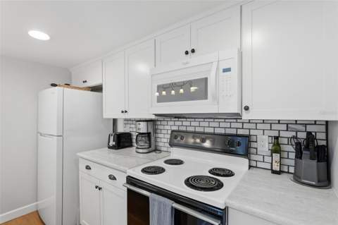 175 Medallion Boulevard #F, Madeira Beach FL - photo 7 of 38