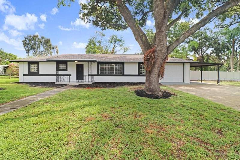3 bedroom Single Family Residence at 12113 Midlake Drive, Tampas North Side Cntry Cl, Tampa — photo 2