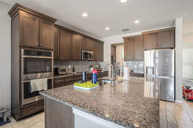 5 bedroom Single Family Residence at 13362 Sage Hollow Avenue, Belmond Reserve Ph 1, Riverview — photo 4