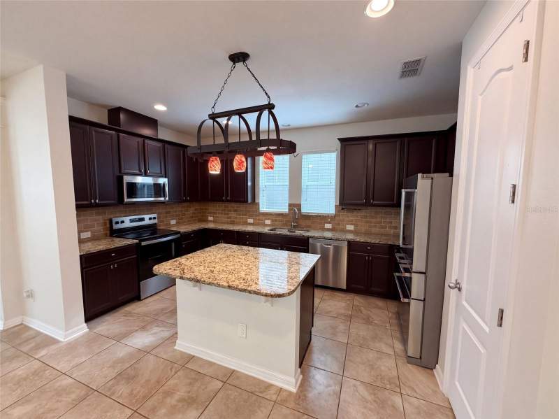 3 bedroom Single Family Residence at 8231 Laureate Boulevard, Laureate Park Ph 1A, Orlando — photo 2