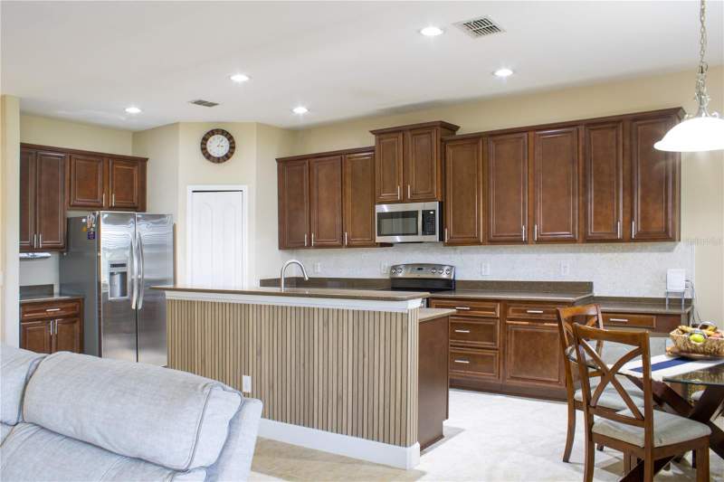 5 bedroom Single Family Residence at 1112 GLENRAVEN LANE, CLERMONT NOTTINGHAM AT LEGENDS, CLERMONT — photo 3